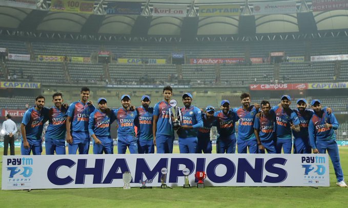 Team India posing with the trophy after the match at Wankhede Stadium