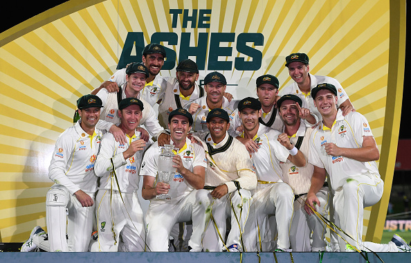 Australia holds the Ashes urn | Getty