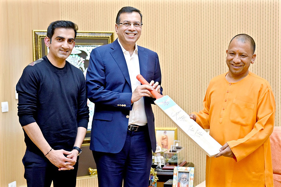 Gautam Gambhir and Sanjiv Goenka with UP CM Aditya Yoginath