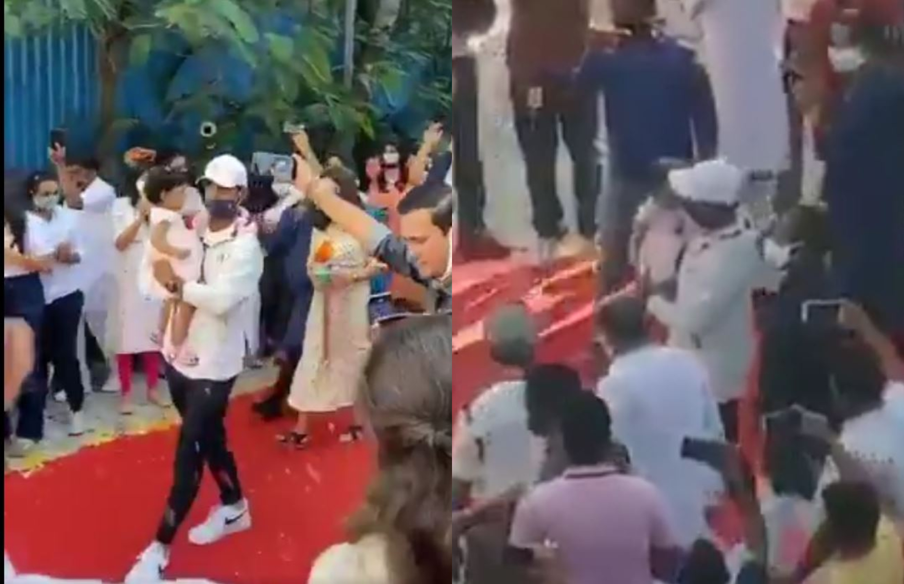 Rahane seen here carrying his daughter receives red carpet welcome with flower showers