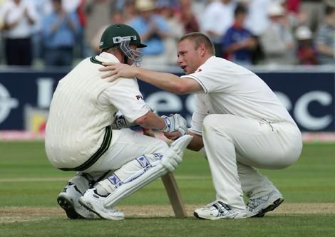 Andrew Flintoff of consoling Brett Lee | Getty Images