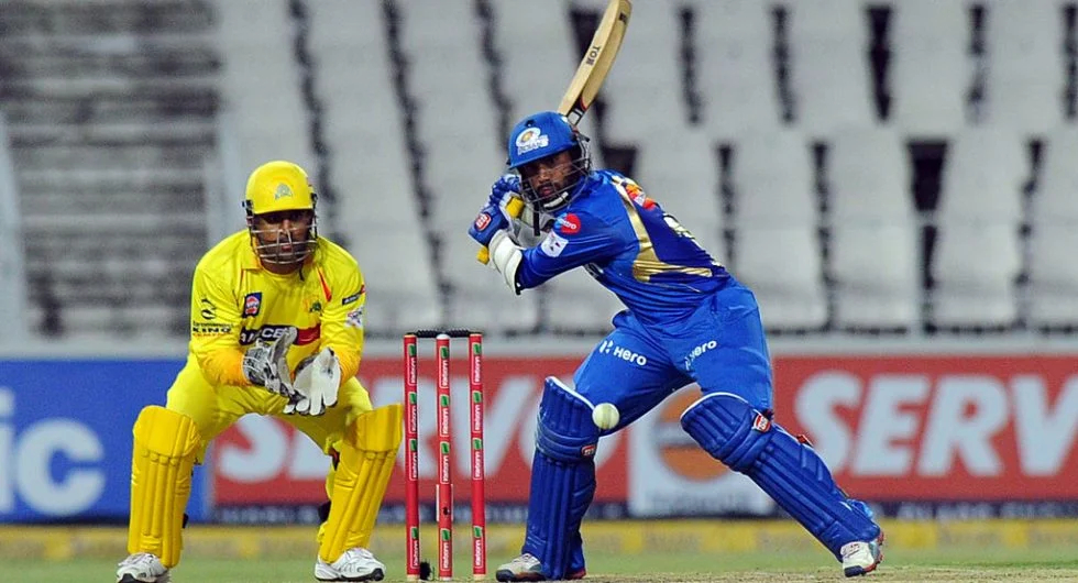 MS Dhoni and Dinesh Karthik during an IPL match | Getty