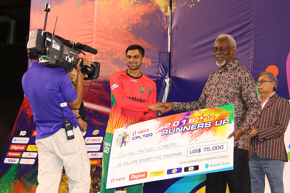 Malik with CPL runner up prize | Getty Images