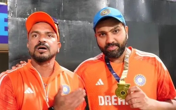 T Dilip and Rohit Sharma with Fielding medal | X