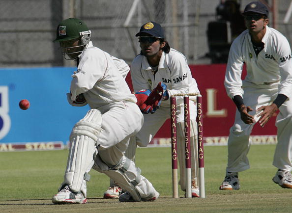 Tatenda Taibu playing spin as Rahul Dravid stands in the slips | Getty