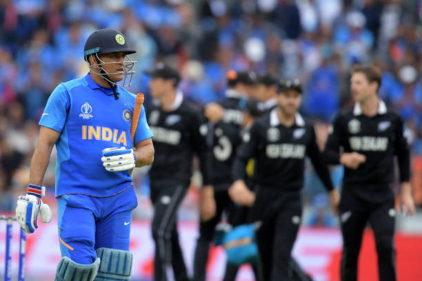MS Dhoni returning after being run-out in the World Cup semi-final against New Zealand | Getty