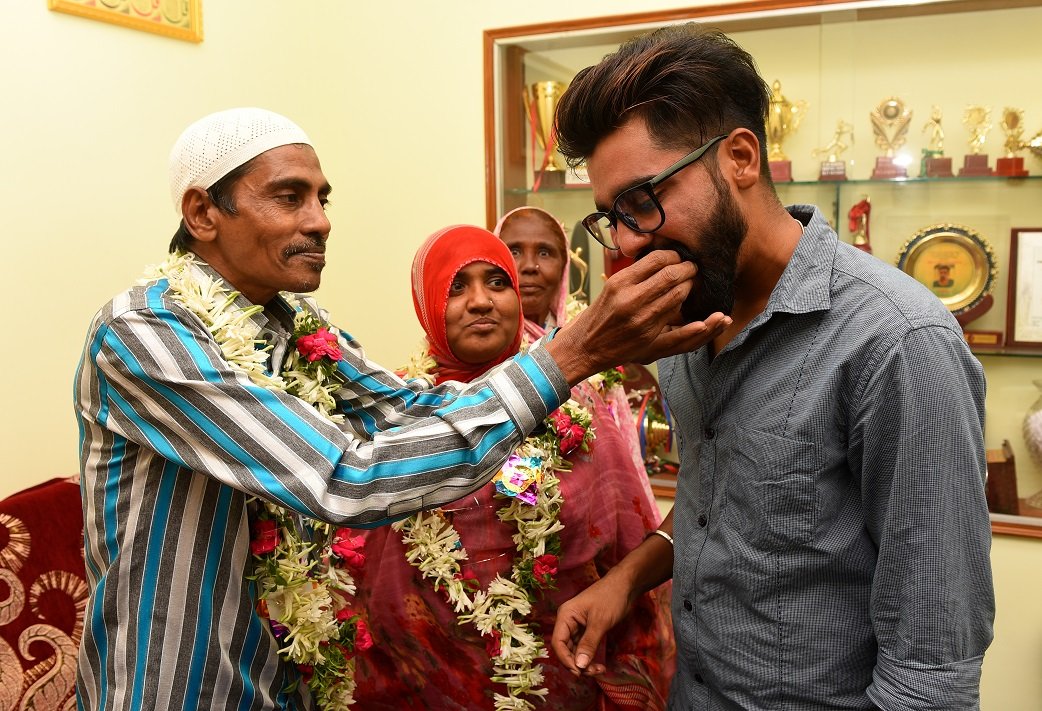 Mohammed Siraj with his father and mother