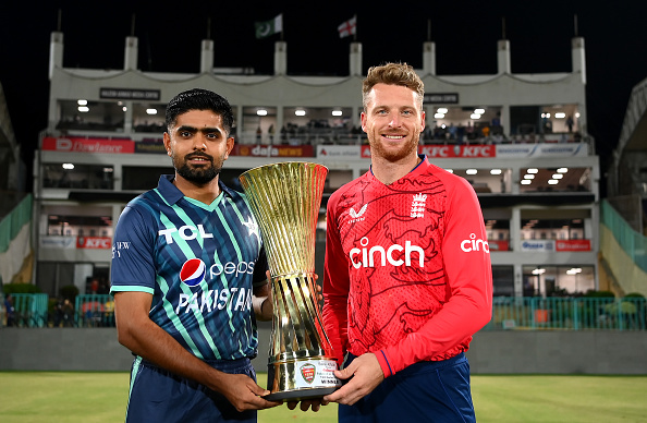 Babar Azam and Jos Buttler with the T20I series trophy | Getty Images