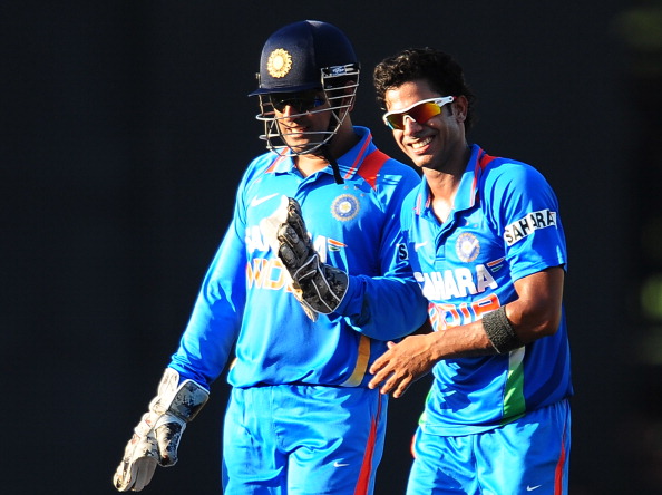Manoj Tiwary and MS Dhoni | Getty