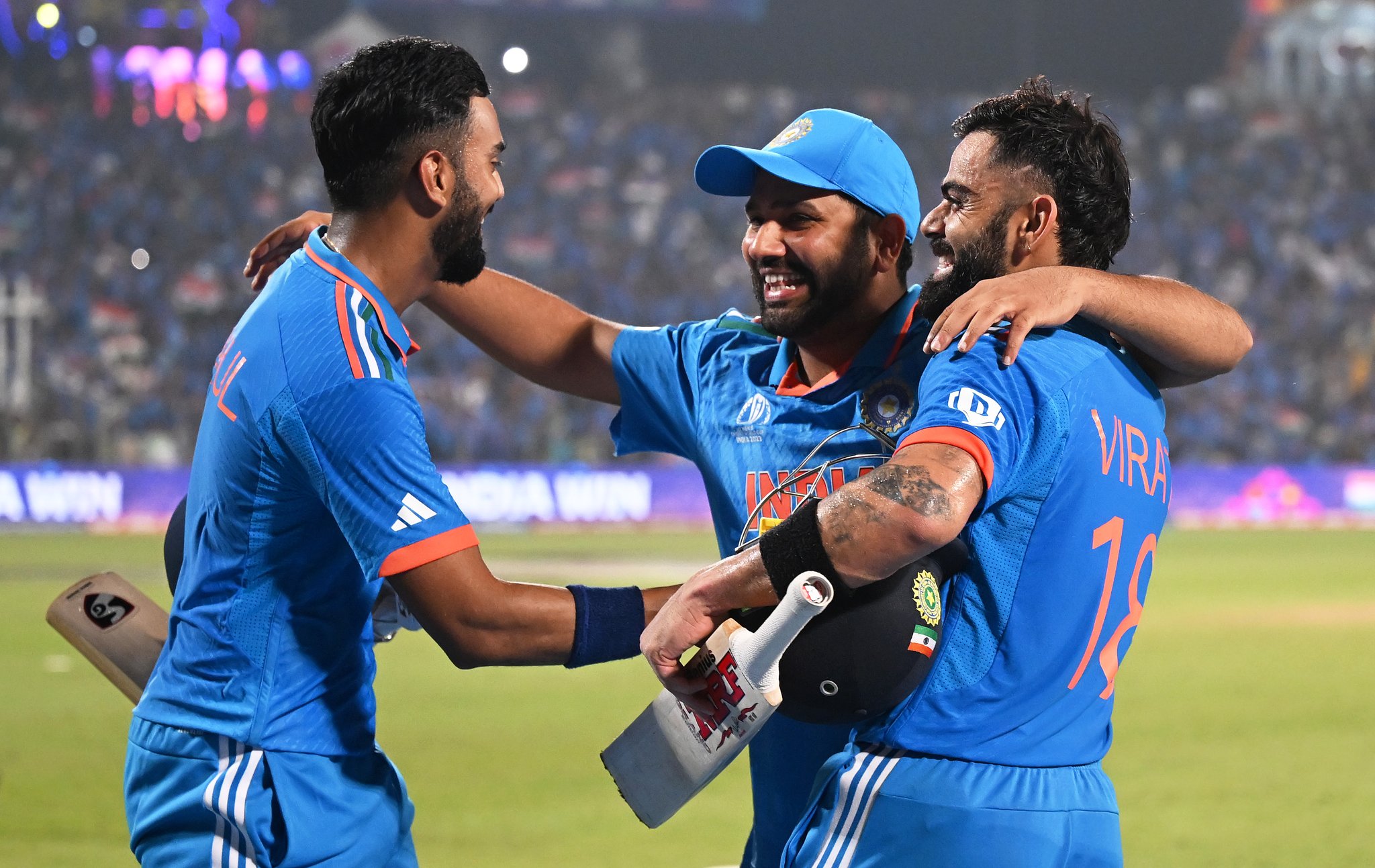 Rohit Sharma hugs Virat Kohli and KL Rahul | Getty Images 