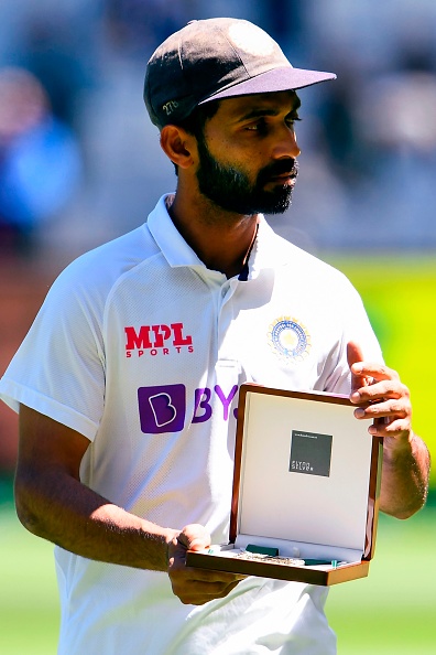 Ajinkya Rahane with the Johnny Mullagh medal after getting the Man of the Match award | Getty