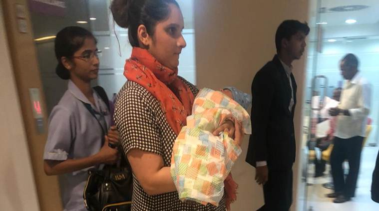Sania Mirza holding her new born.
