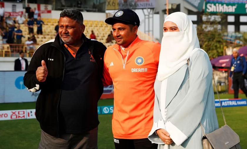 Sarfaraz Khan with his father Naushad and wife after receiving his India Test cap | Getty