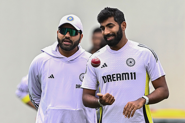 Jasprit Bumrah and Rohit Sharma | Getty