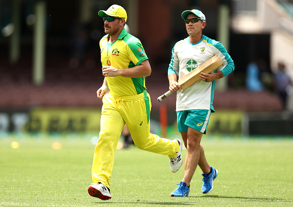 Justin Langer with Aaron Finch | Getty Images