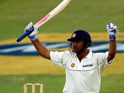 Virender Sehwag celebrates his century on Test debut
