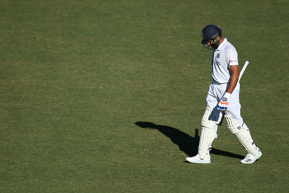Rohit Sharma walking off at the SCG | Getty