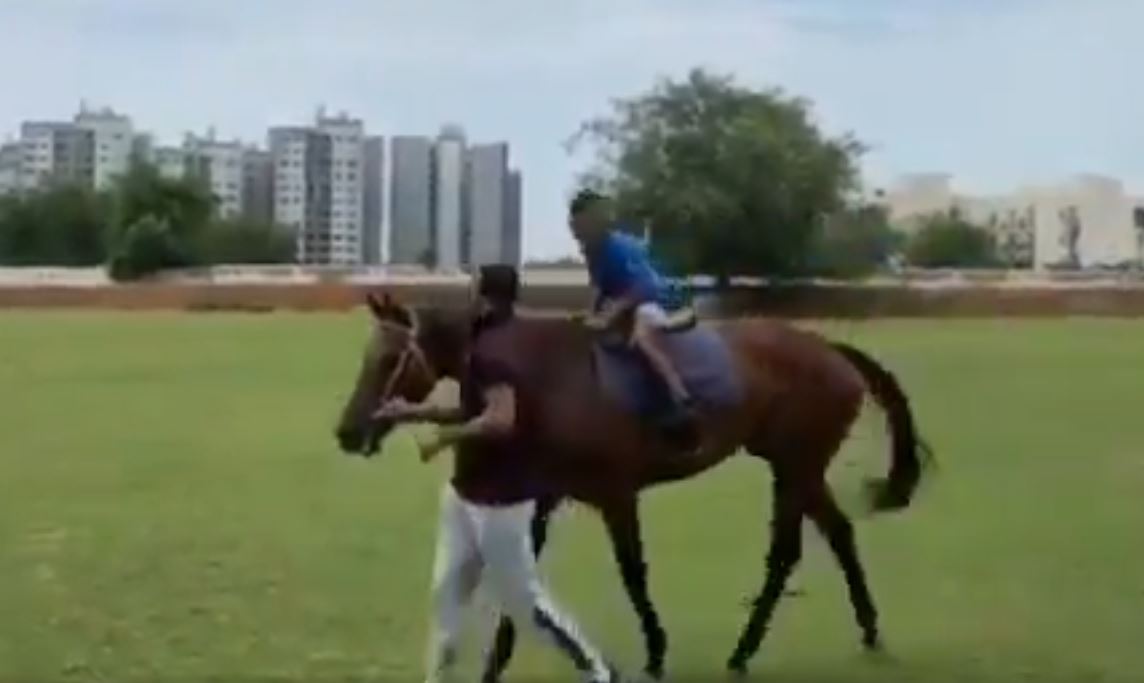 Dhawan taking son Zoraver for a ride on a horse | Twitter