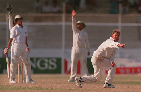 Warne bowls during the 1994 Karachi Test | Getty