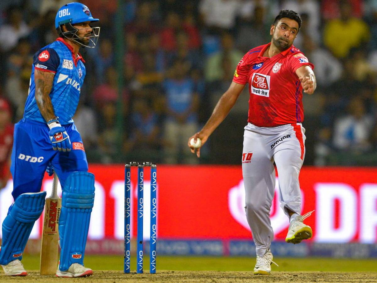 Ravichandran Ashwin (R) bowling in the IPL | AFP