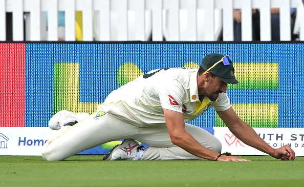 Starc grounded the ball after taking the catch | Getty