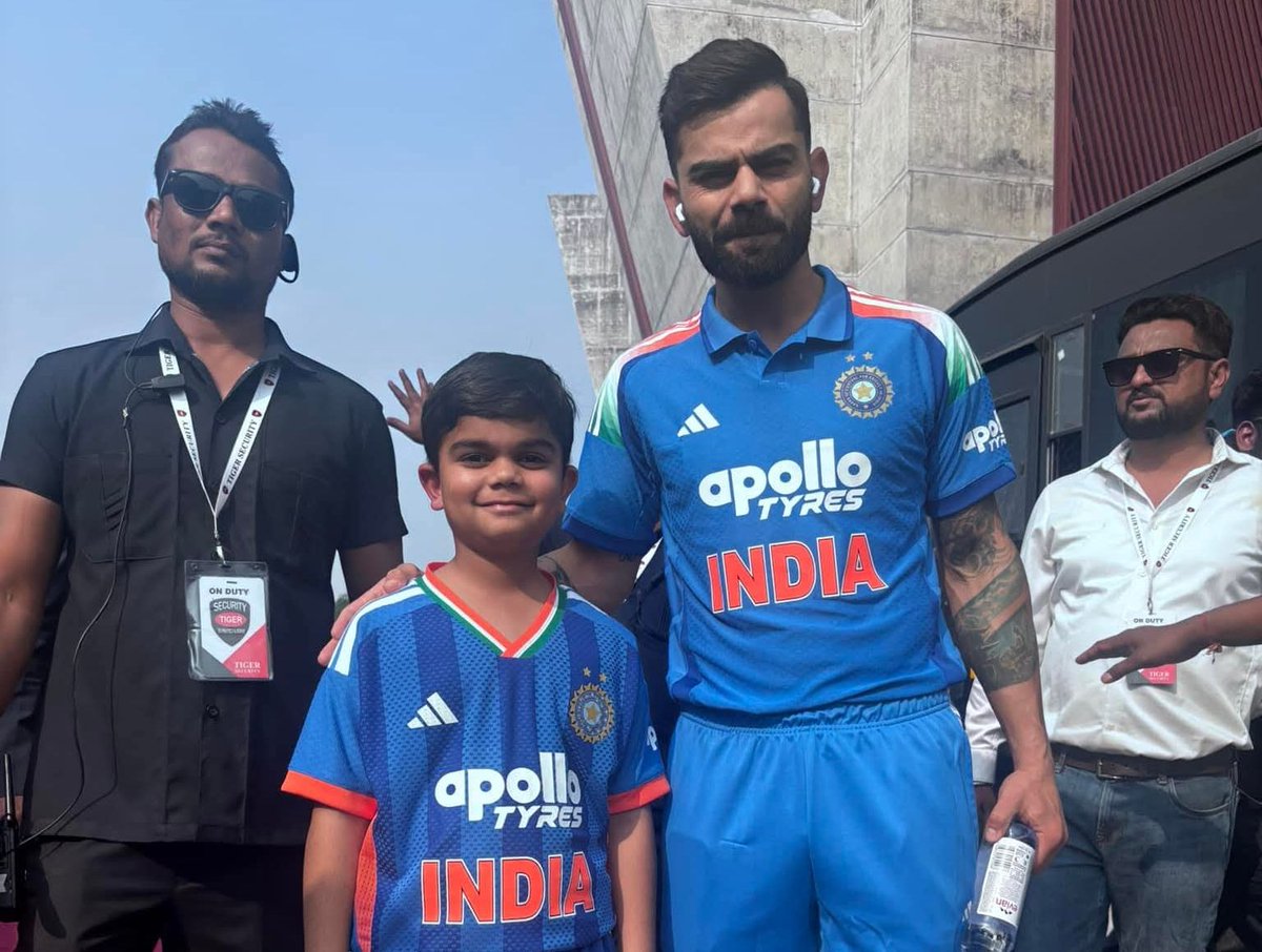 Virat Kohli with a young fan who looked a lot like Kohli's young self | X