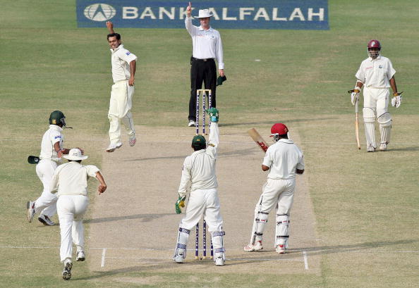Mohammad Hafeez celebrates after dismissing Brian Lara during a Test match in Lahore in 2006 | Getty
