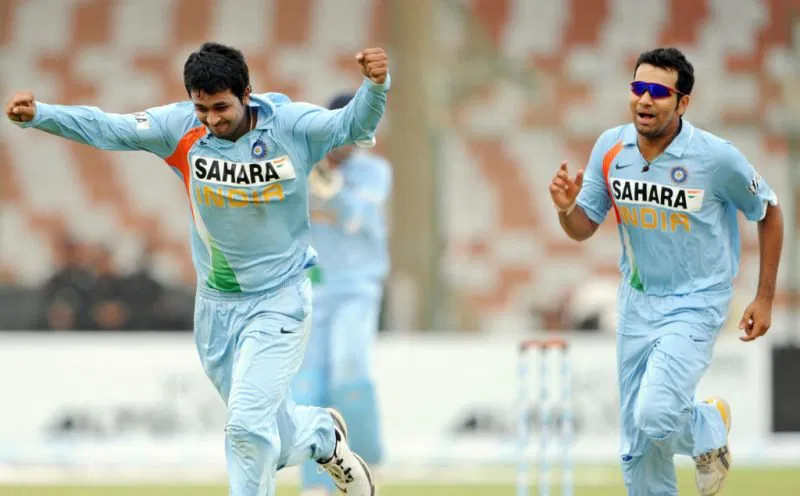 Pragyan Ojha and Rohit Sharma | X