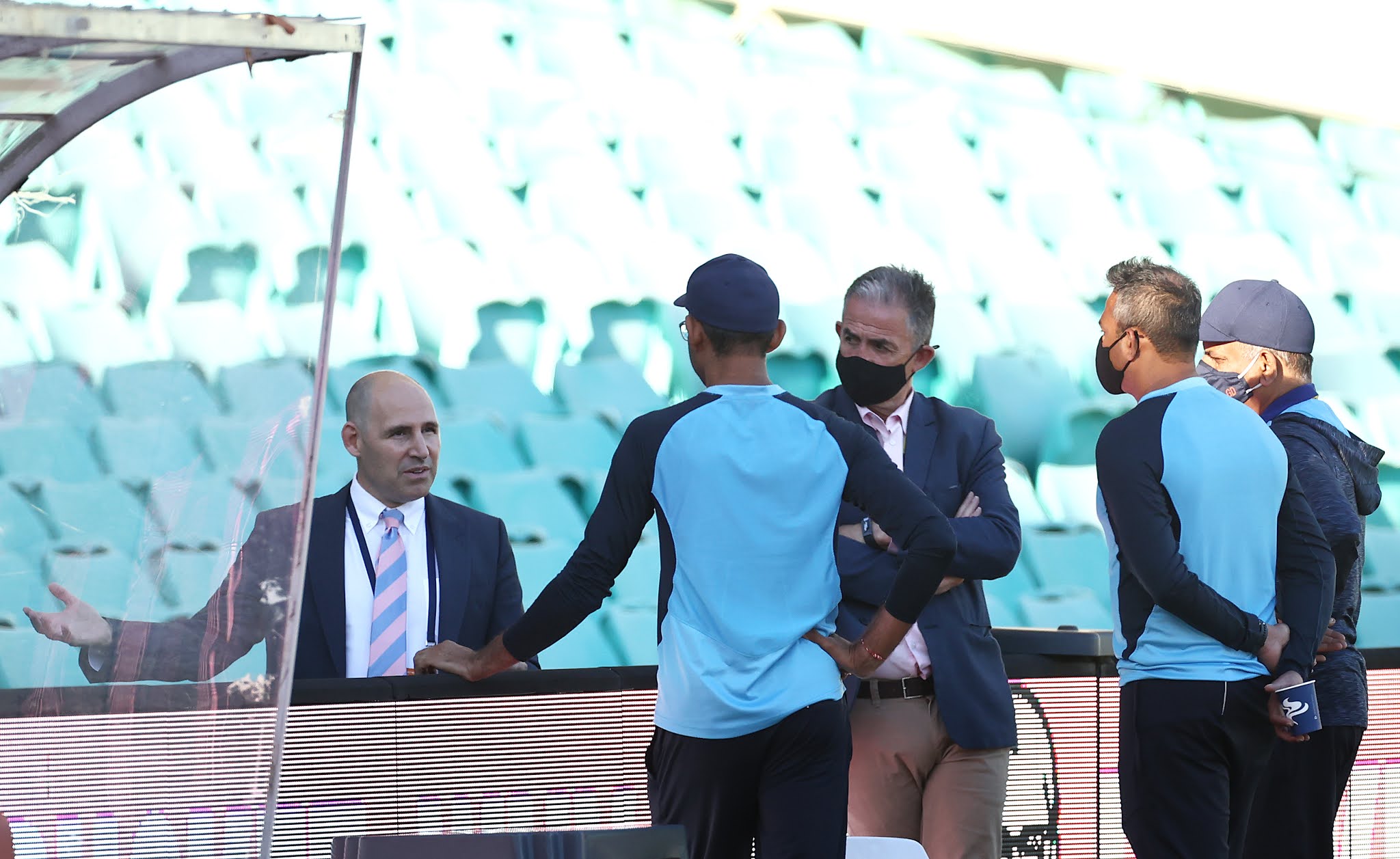 CA CEO Nick Hockley and CA Head of Integrity and Security Sean Carroll speak with Indian team management | Getty