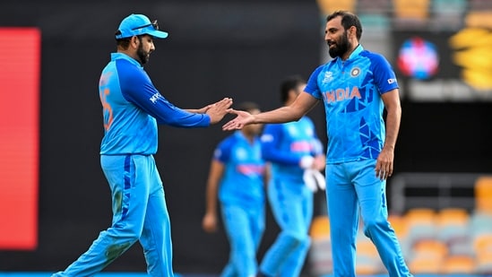 Mohammad Shami with Rohit Sharma | AFP