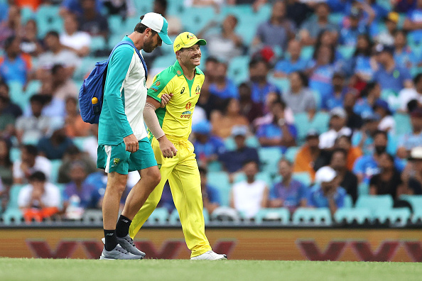 David Warner looked in pain as he limped off the field | Getty
