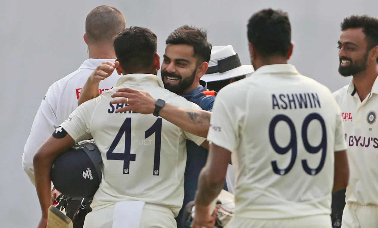 Virat Kohli hugs Shreyas Iyer as Ashwin looks on | AP