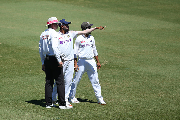 Mohammed Siraj and Ajinkya Rahane in talks with the umpire | GETTY