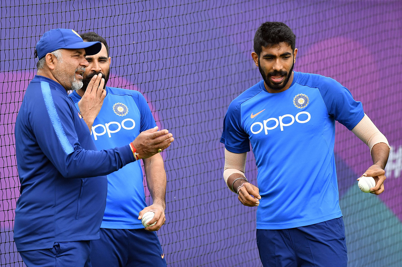 B Arun with Jasprit Bumrah and Mohammad Shami | Getty 