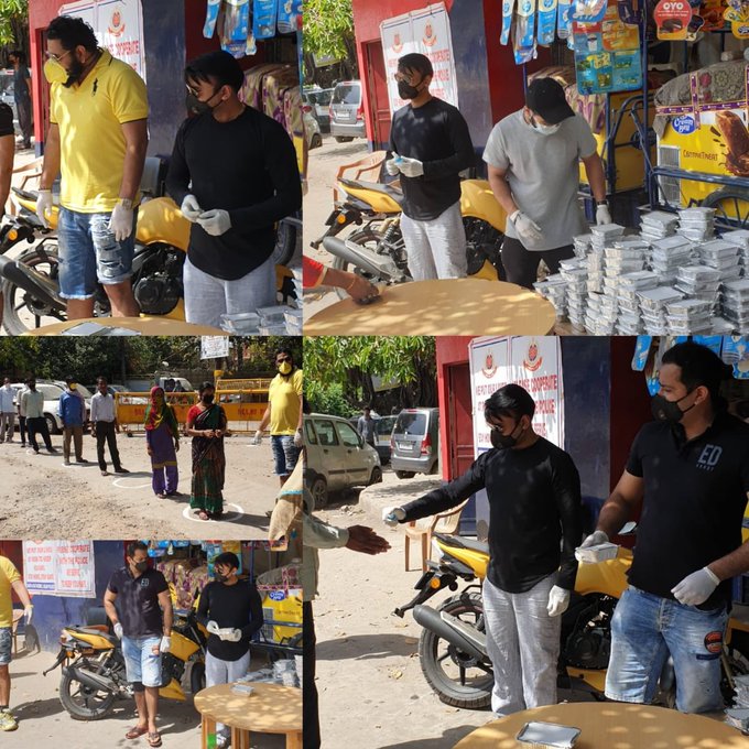 Mishra distributing food to needy people | Twitter