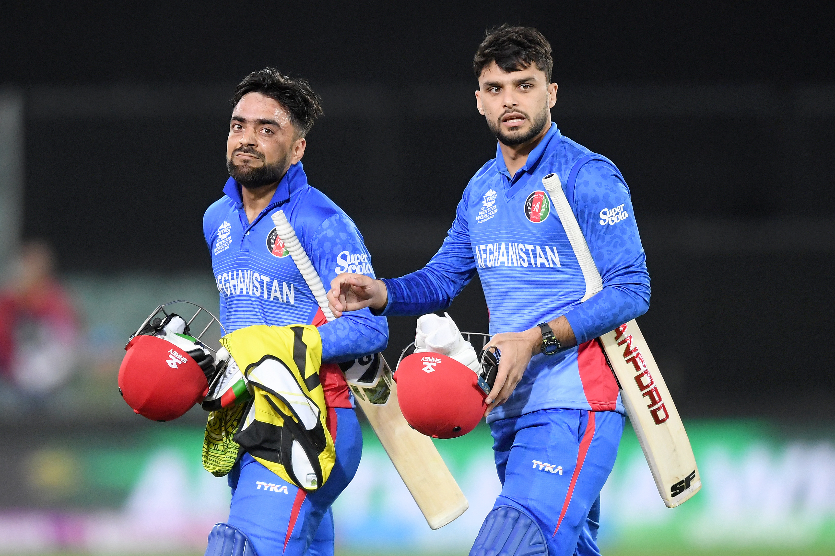 Rashid Khan and Naveen Ul Haq | Getty