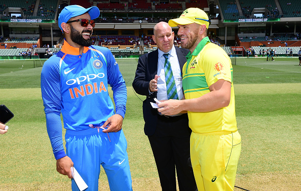 Virat Kohli and Aaron Finch | Getty