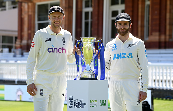 Kane Williamson and Joe Root pose with the Test series trophy | Getty
