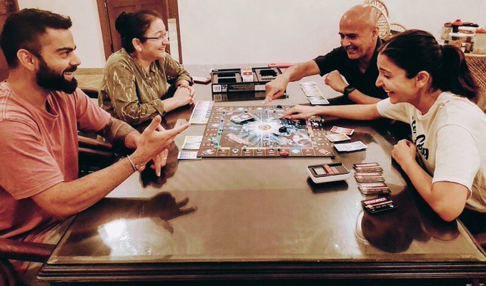 Virat Kohli and Anushka Sharma enjoying a game of Monopoly with parents | Twitter