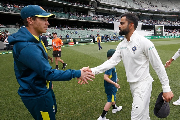 Tim Paine and Virat Kohli | Getty