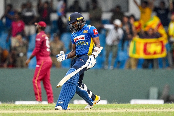 Wanindu Hasaranga celebrates after guiding Sri Lanka over the line | Getty