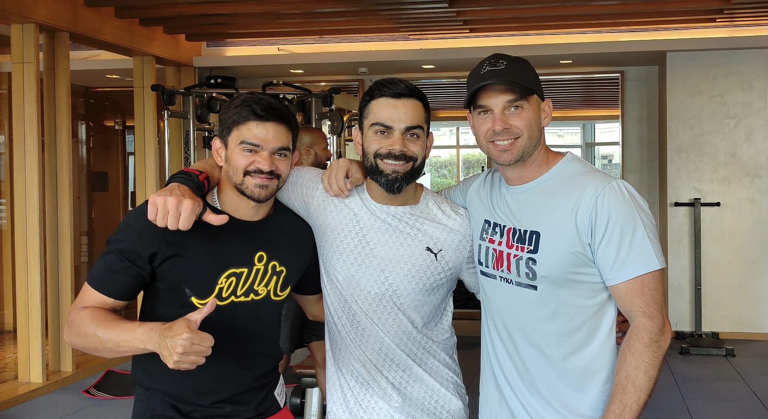 Soham Desai (L) Virat Kohli (C) and Nick Webb (R). | Virat Kohli Twitter 