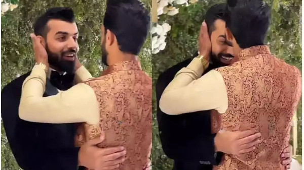 WATCH- Shadab Khan gets kissed on the forehead by Hassan Ali at his wedding reception