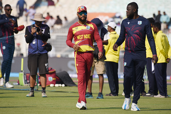 Daren Sammy with Shai Hope | Getty