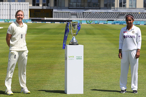 Heather Knight and Mithali Raj pose with the Test trophy in Bristol | Getty Images