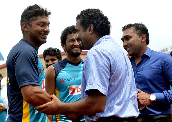 Kumar Sangakkara and Muttiah Muralitharan share a laugh | Getty