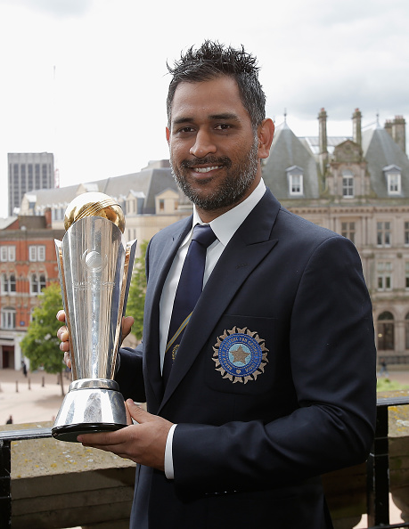 MS Dhoni with the 2-13 Champions Trophy, the last ICC event India won | Getty