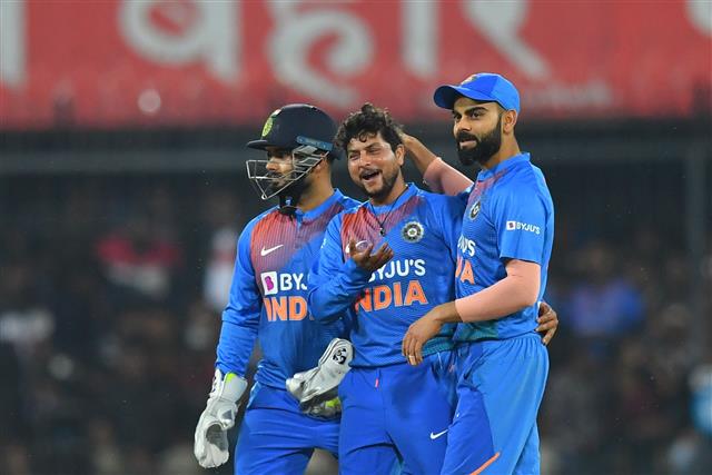 Rishabh Pant, Kuldeep Yadav and Virat Kohli | AFP
