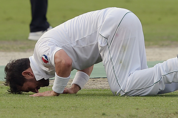 Yasir Shah prostrates as he celebrates 10 wickets in an innings of a Test match | Getty Images