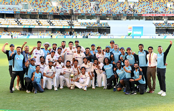 Indian players and support staff posing with the Border-Gavaskar Trophy | Getty